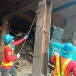 REMOVAL OF SOIL AT TOP OF KING POST